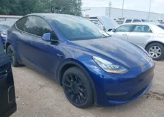 2023 Tesla Model Y — фото 1